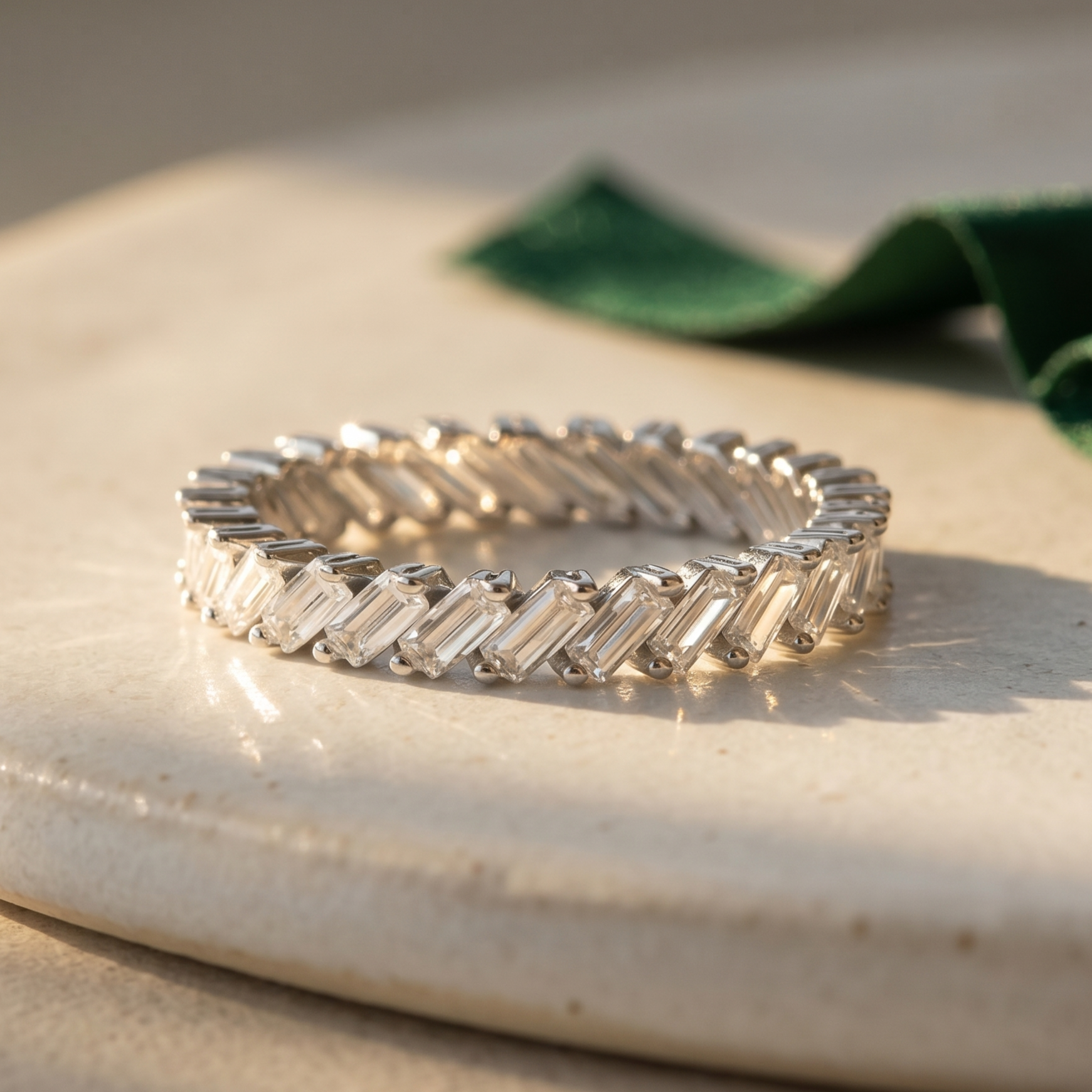 showing a 92.5 silver ring with  baguette stones in a contemporary diagonal arrangement.
