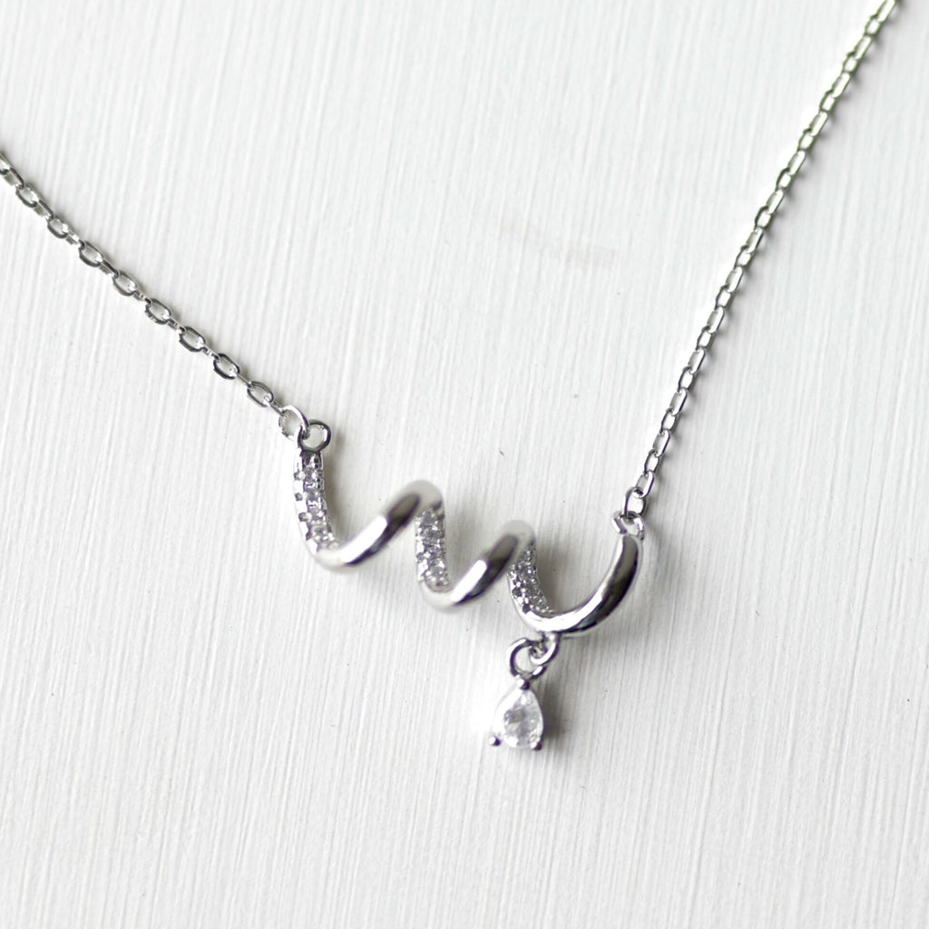 The Spiral Ribbon & Teardrop Pendant