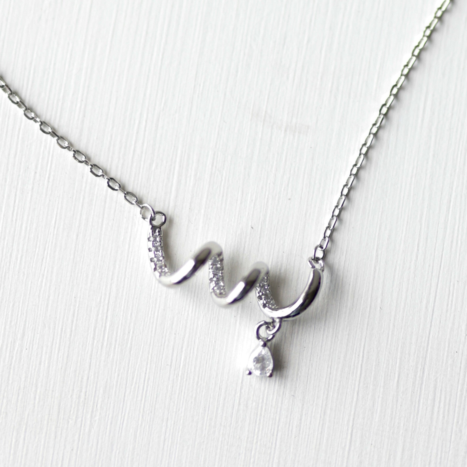 The Spiral Ribbon & Teardrop Pendant