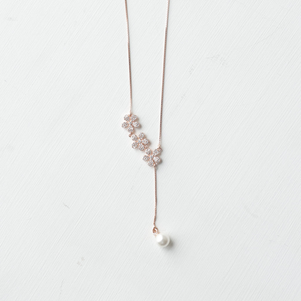 The Pavé Petal Pearl Drop Necklace
