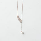 The Pavé Petal Pearl Drop Necklace