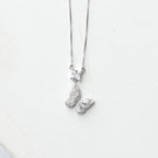 The Radiant Butterfly & Princess-Cut Pendant