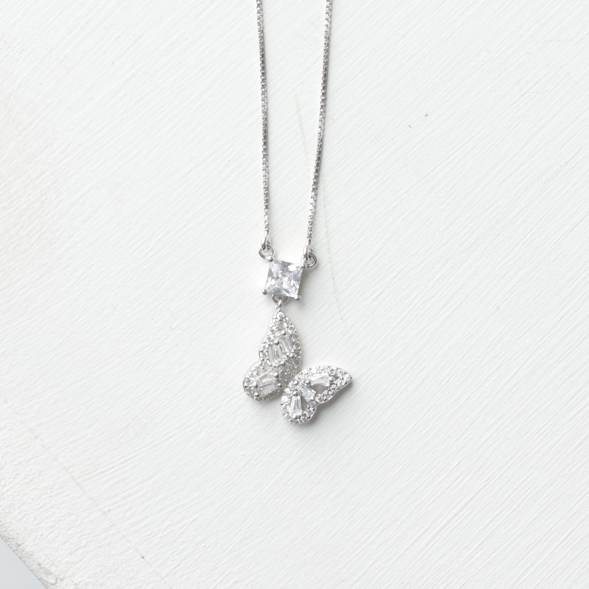 The Radiant Butterfly & Princess-Cut Pendant