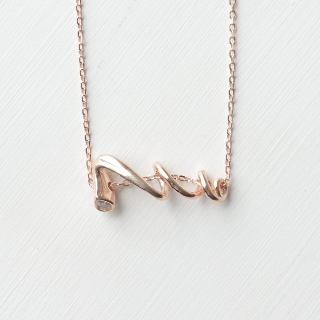 The Serpentine Solitaire Necklace