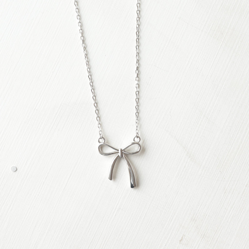 The Vega Silver Ribbon Bow Necklace