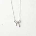 The Vega Silver Ribbon Bow Necklace