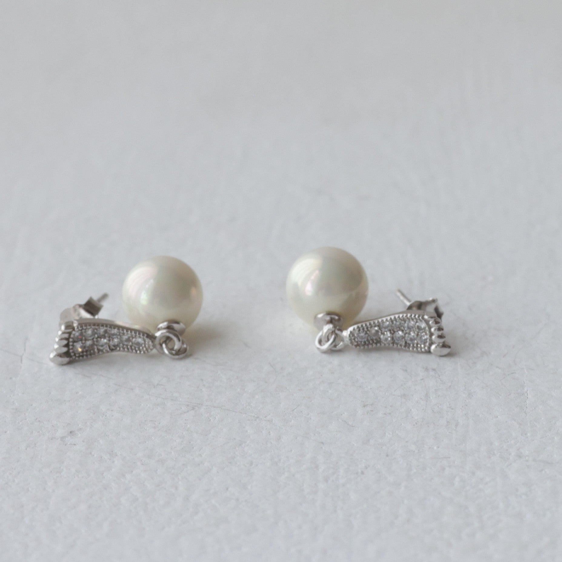 The Crystal Footprint & Pearl 92.5 Silver Drops