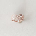 The Rose Gold Ribbon Interlace Ring