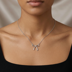 The Vega Silver Ribbon Bow Necklace
