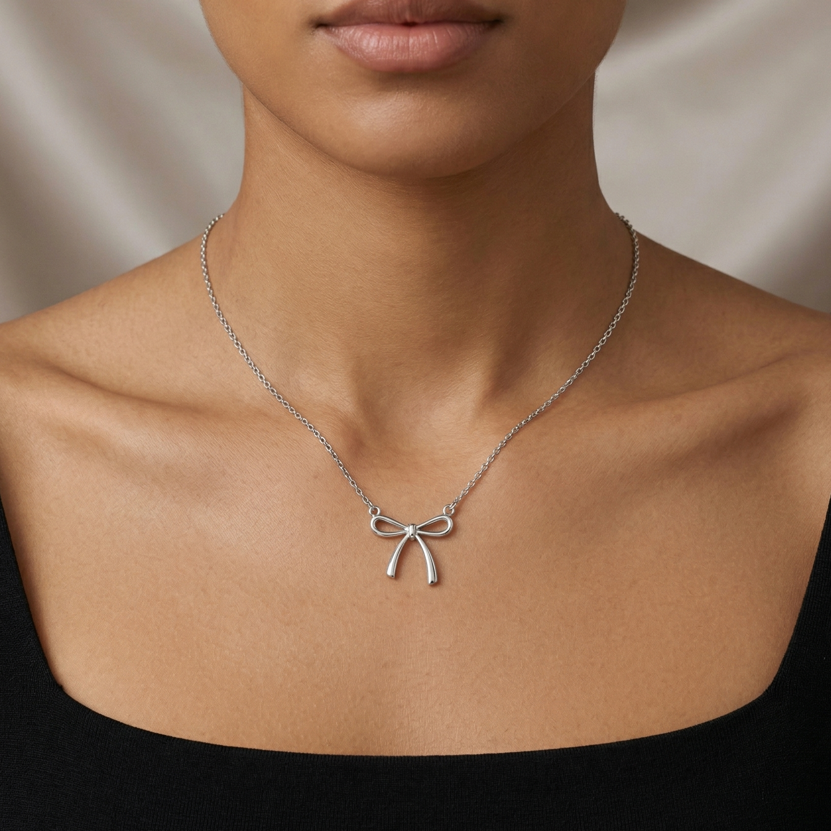 The Vega Silver Ribbon Bow Necklace